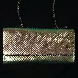 Henri Bendel Uptown Wallet on a chain holograph